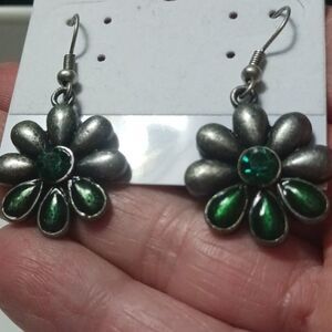 Silver toned fishhook earrings floral design with emerald green stones